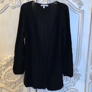 Say What? Black sweater. M